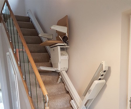 stairlift at bottom of stairs